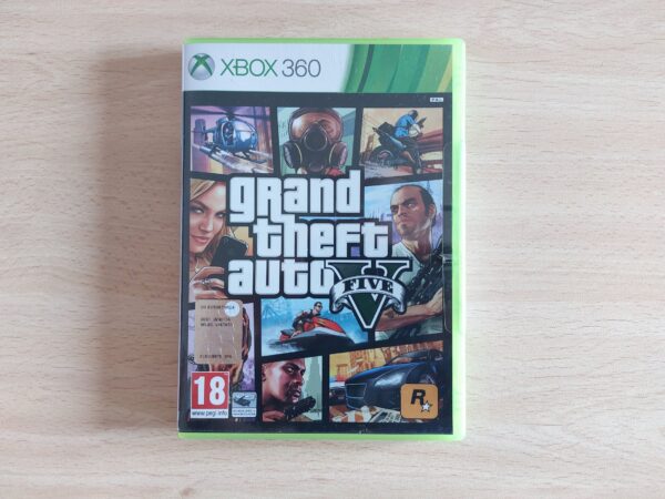 Grand Theft Auto V (En muy buen estado, disco con ligeras marcas de uso)
